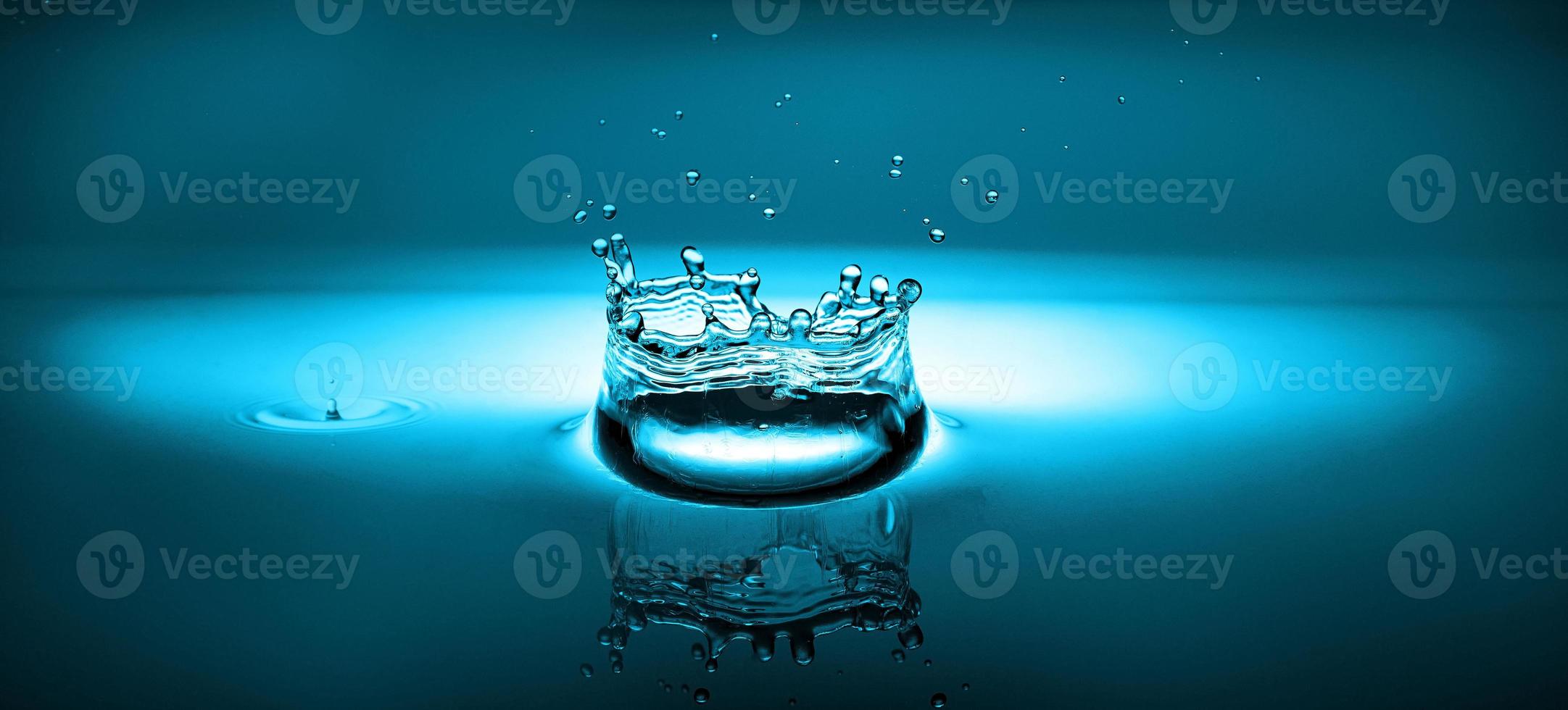 splash of water on a blue background photo