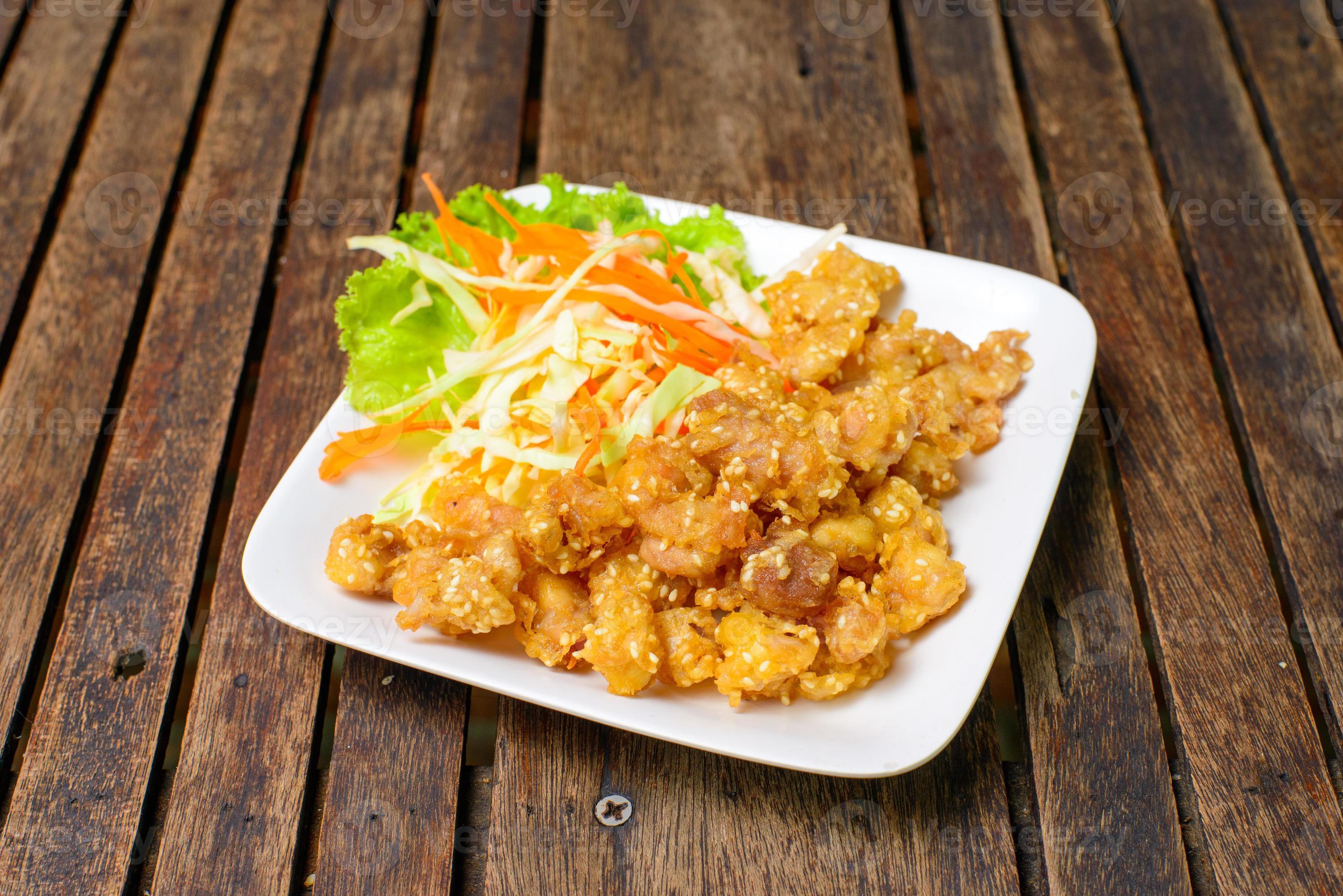 Deep fried chicken tendons on the white dish. 15633339 Stock Photo at