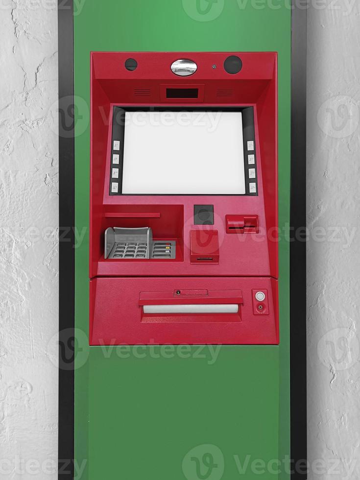 Atm Machine on concrete wall photo