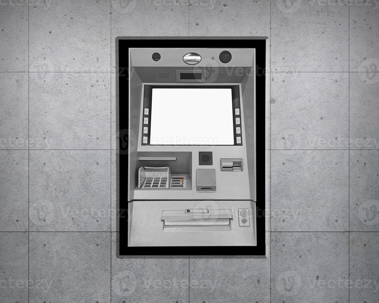 Atm Machine on concrete wall photo