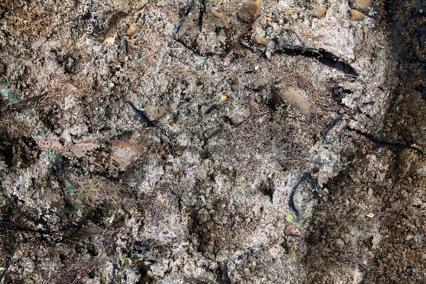 Detailed close up view on a brown sand ground texture photo