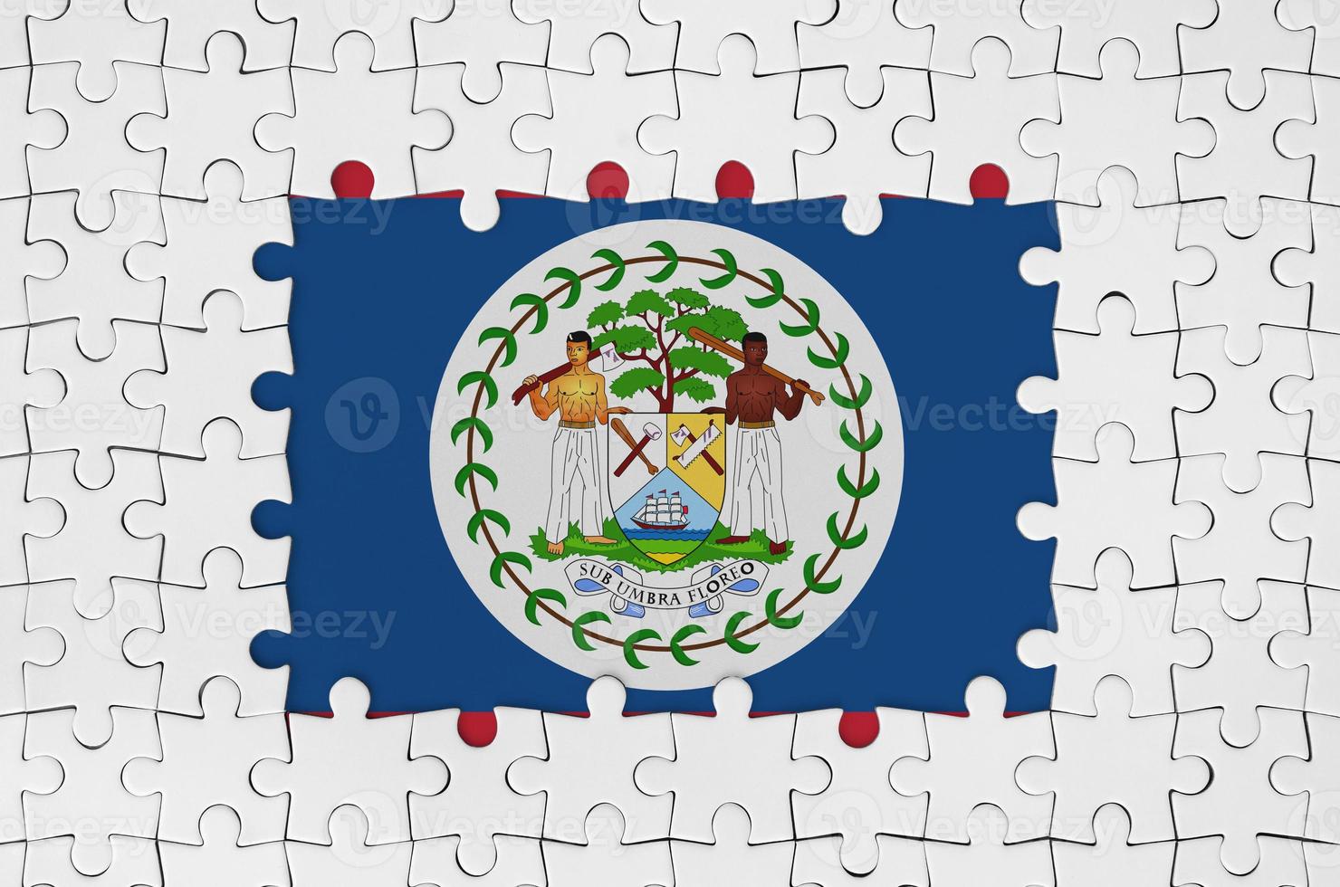 Belize flag in frame of white puzzle pieces with missing central part photo