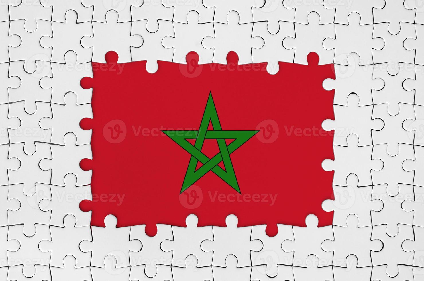 Morocco flag in frame of white puzzle pieces with missing central part photo