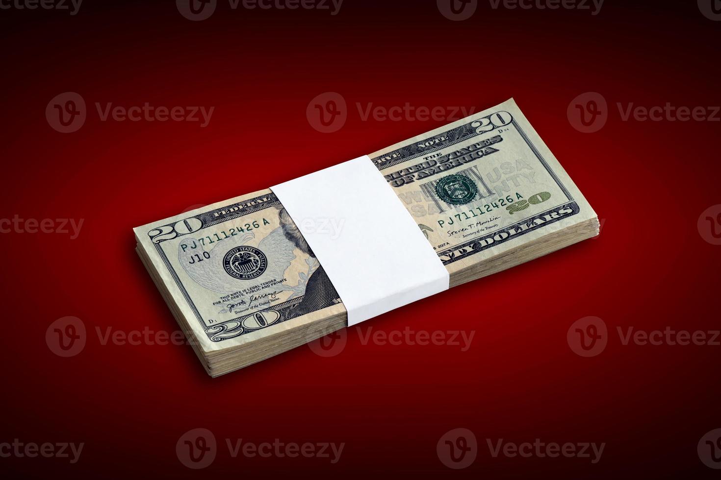 Bundle of US dollar bills isolated on white. Pack of american money with high resolution on perfect white background photo