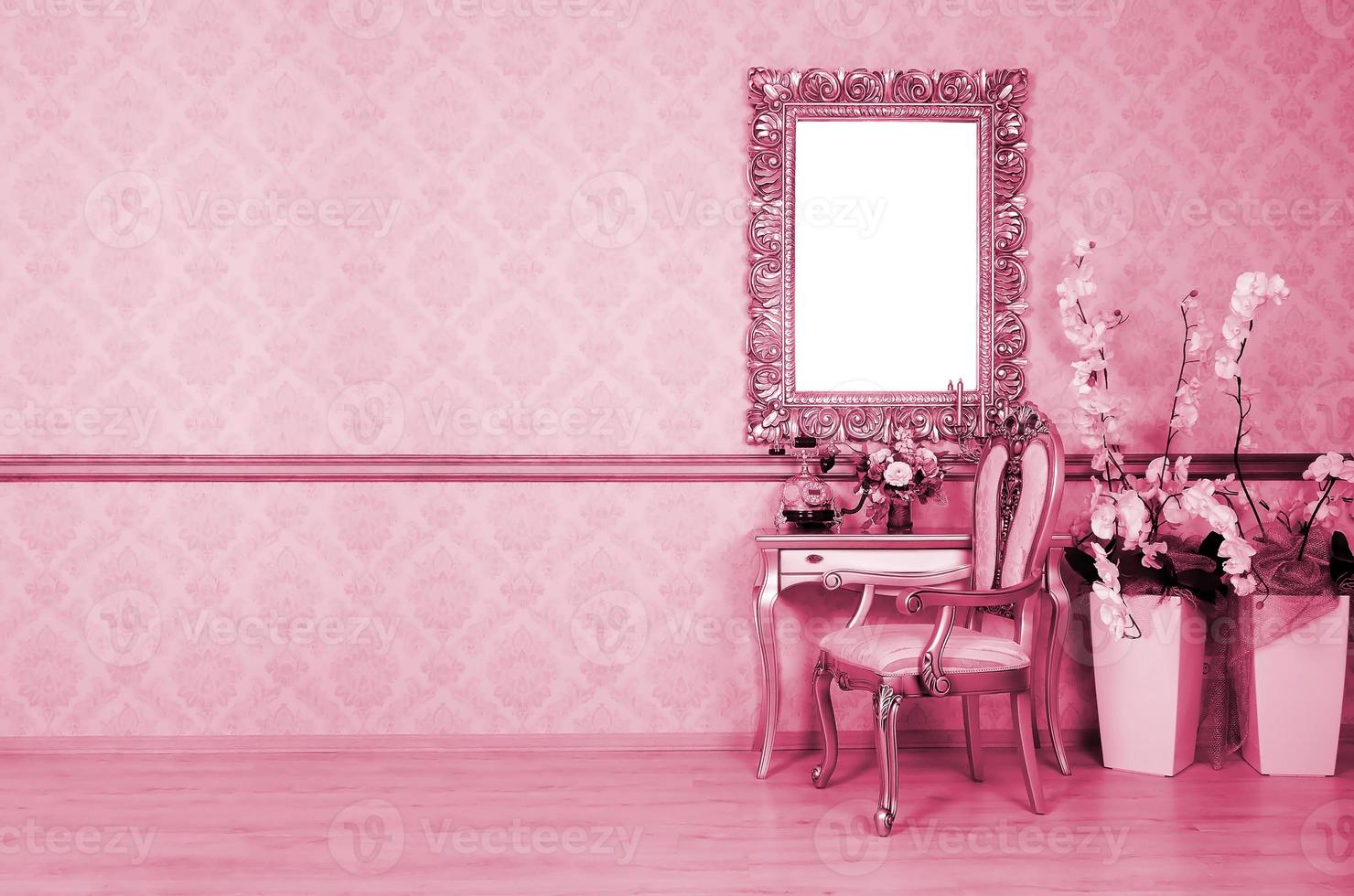 A fragment of a retro interior with a chair and table, on which is a telephone and a vase of flowers. Image toned in Viva Magenta, color of the year photo