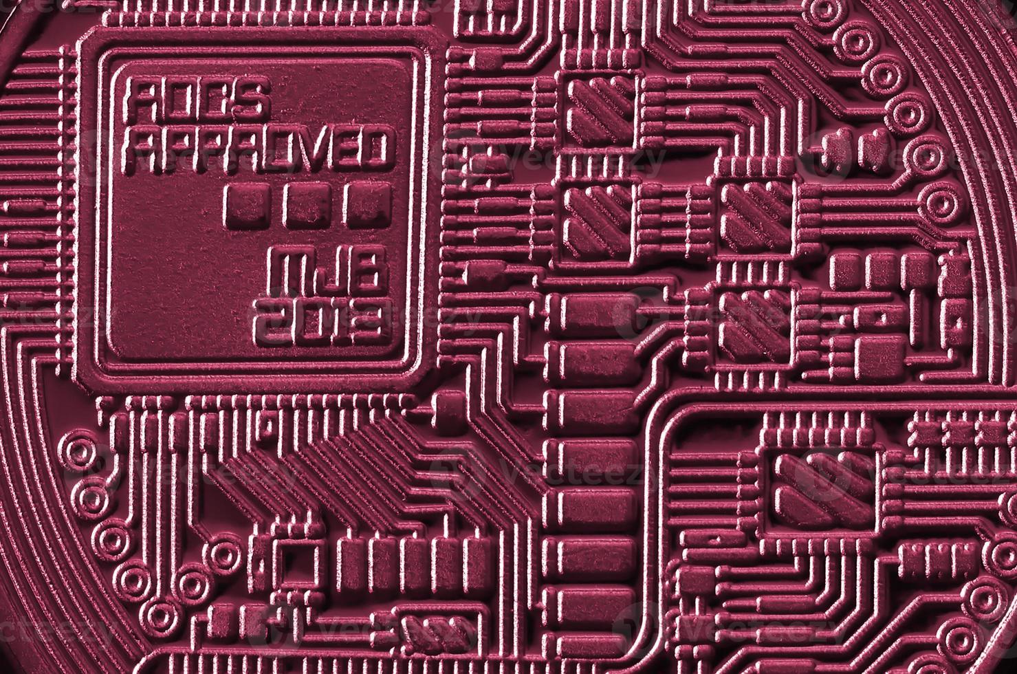 Macro photography of metal bitcoin. Close up shiny metal texture. Abstract business and modern technology background. Image toned in Viva Magenta, color of the 2023 year photo