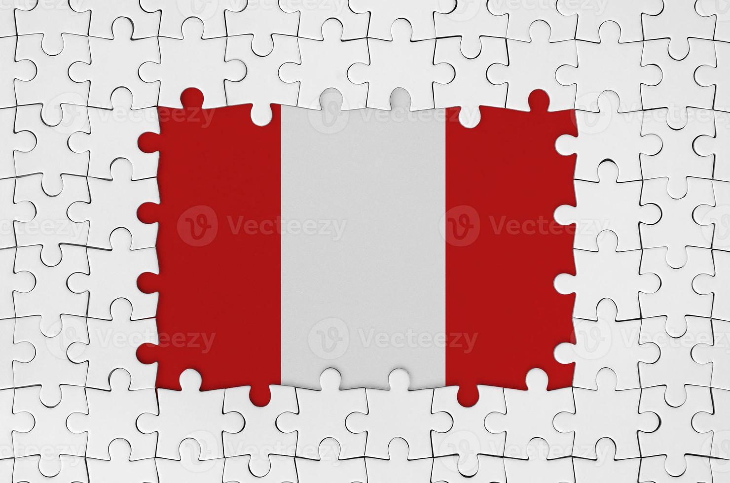 Peru flag in frame of white puzzle pieces with missing central part photo