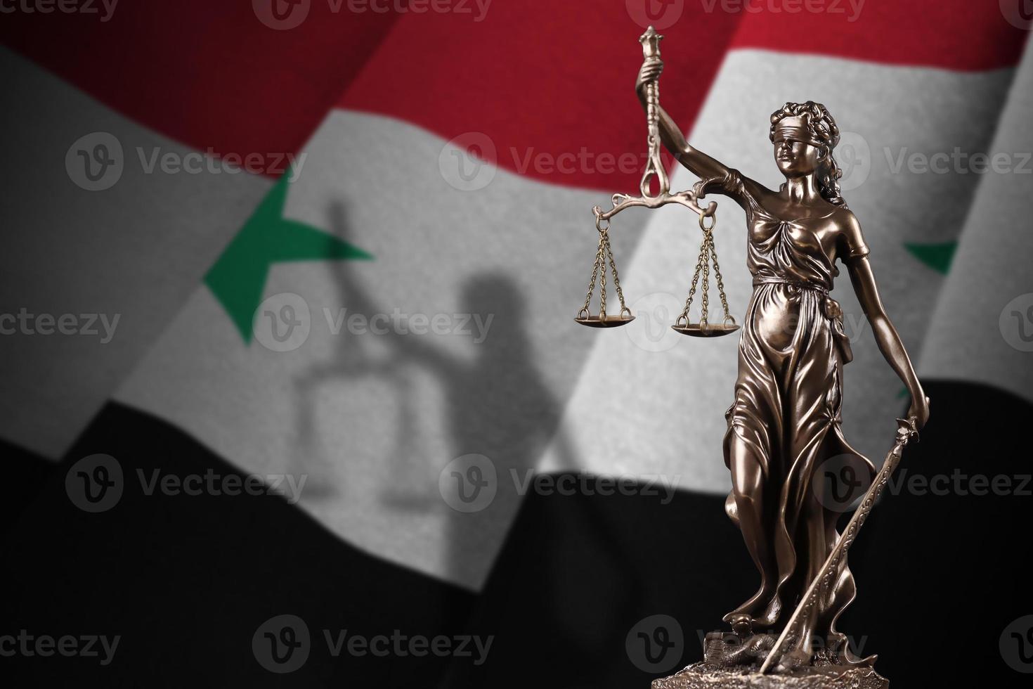Syria flag with statue of lady justice and judicial scales in dark room. Concept of judgement and punishment photo