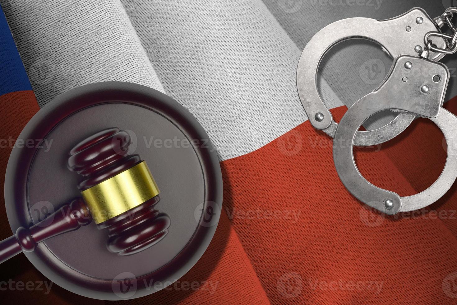 Chile flag with judge mallet and handcuffs in dark room. Concept of criminal and punishment, background for judgement topics photo