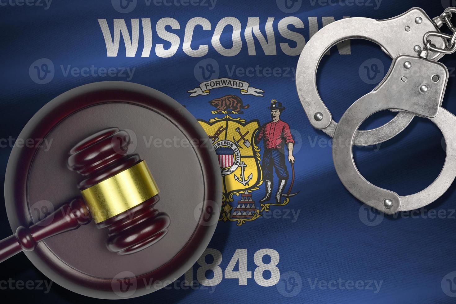 Wisconsin US state flag with judge mallet and handcuffs in dark room. Concept of criminal and punishment photo