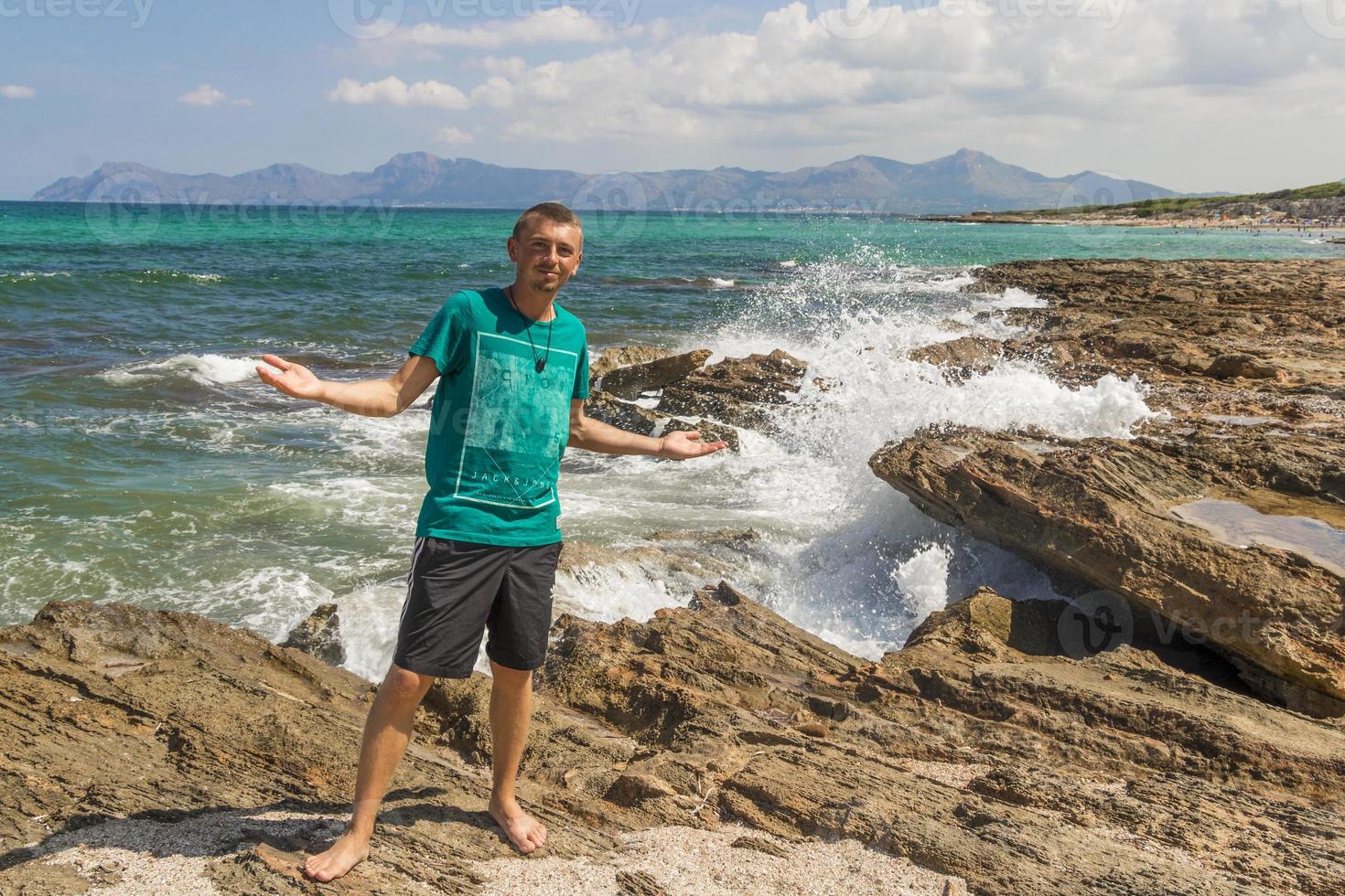 World traveling man travels round trip through island Mallorca Spain. photo