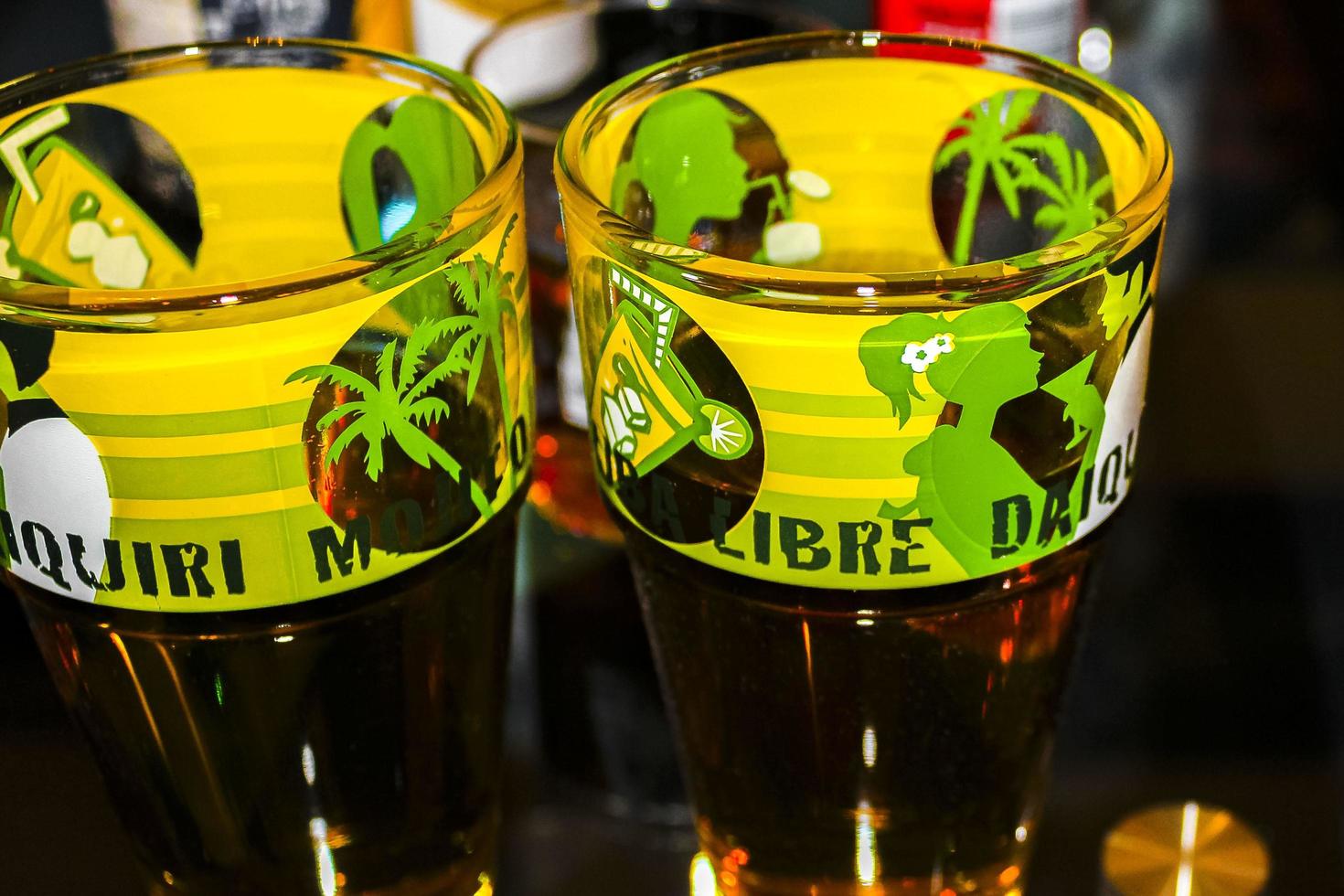 Leherheide Bremerhaven Germany 2010 Green yellow Cuba Libre Glasses in bar discotheque at night. photo