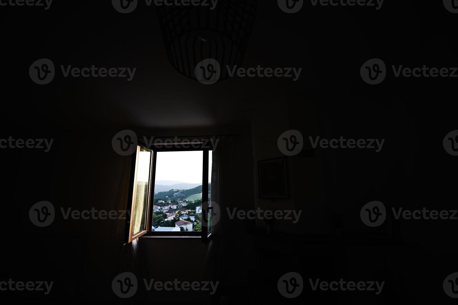 Open window of dark room in sunset. 15652936 Stock Photo at Vecteezy