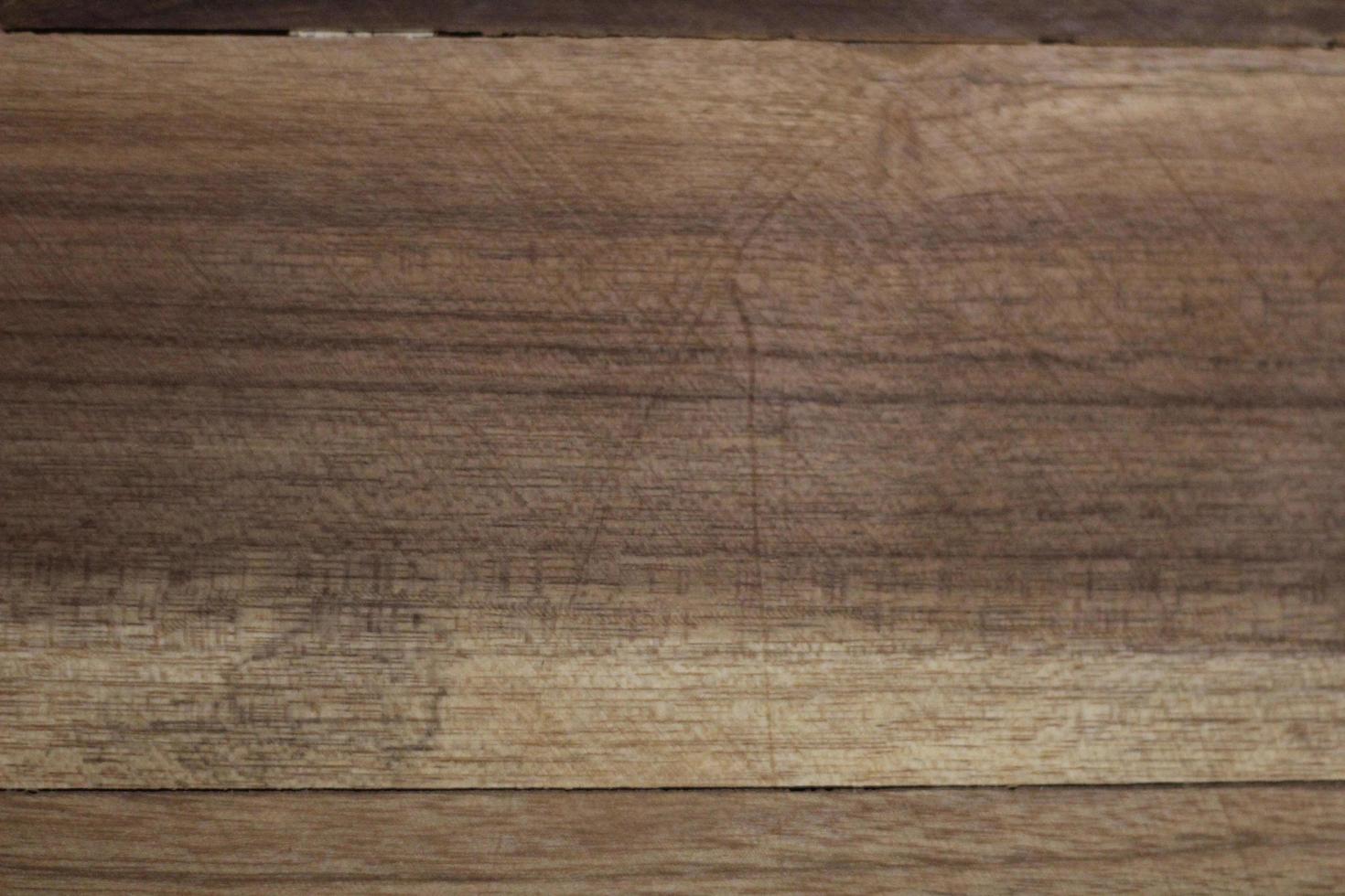 Dark brown textured wooden background. Suitable for packaging product background, or buildings. etc photo