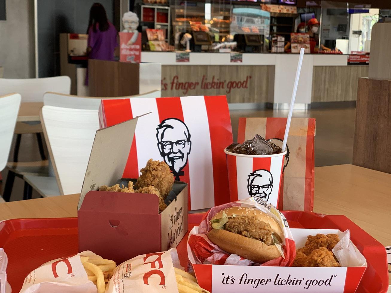 Ayutthaya,Thailand - Apr 06,2022- KFC Hamburger and Fried Chicken set at fast food restaurant Kentucky Fried Chicken KFC is a large restaurant chain. At Big C, Wangnoi branch in Thailand - Asia. photo
