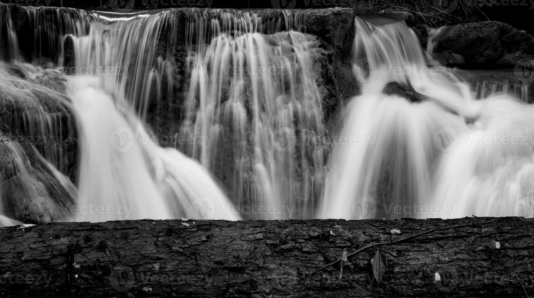 There are trees in front and waterfalls behind,It is a place for time to enjoy the atmosphere in the midst of nature. photo