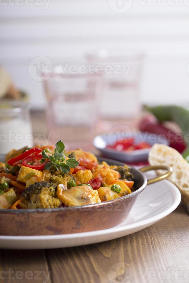Vegan curry with tofu and vegetables photo