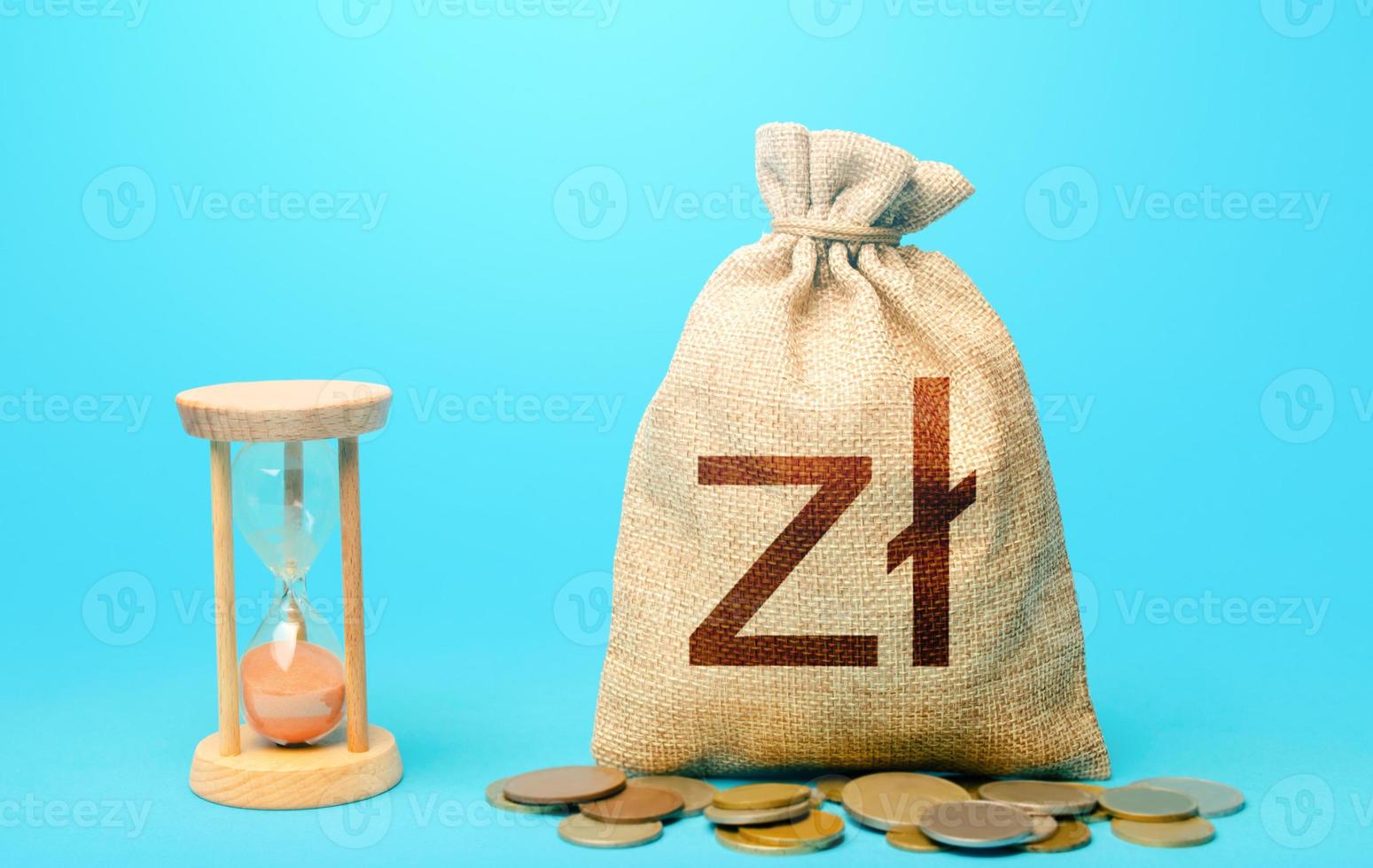 Polish zloty money bag and hourglass. Placing a deposit in the bank. Profitability and return on investment. Time for paying taxes. Pension savings. Customer loyalty program. Mortgage loan photo