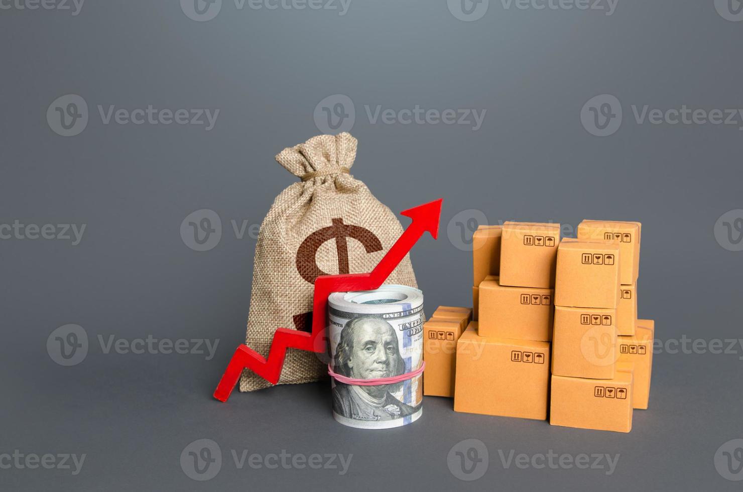 Boxes with a red arrow up and money. Increase in trade volumes, growth of purchasing power. Trade surplus, economic improvement. Fees and Tariffs, customs. High sales. Import and export. Added value photo