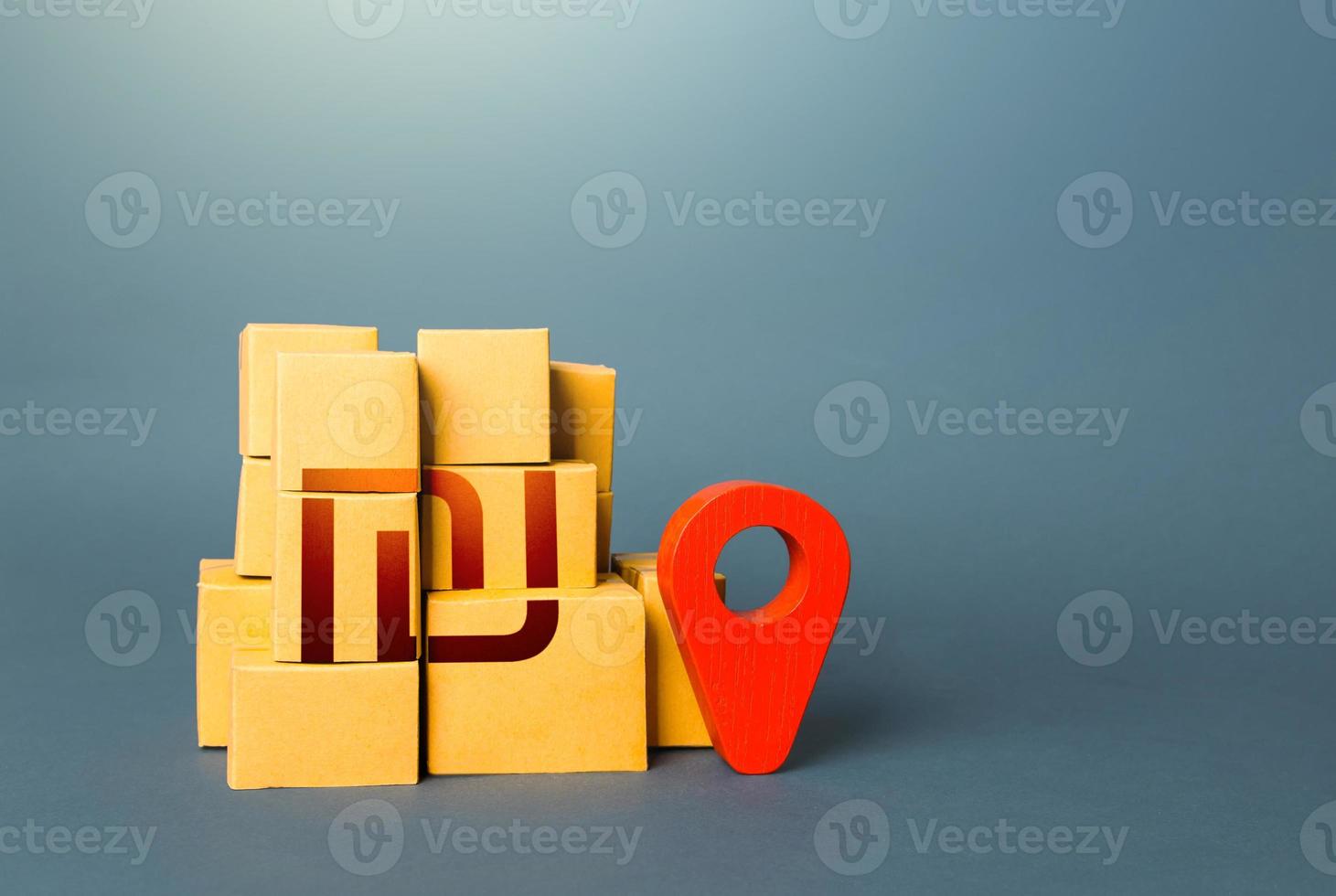 Boxes with israeli shekel symbol and red location pin. Domestic manufacturer. Supply distribution of goods. Transportation delivering logistics, management. Trade in goods. Import export. photo