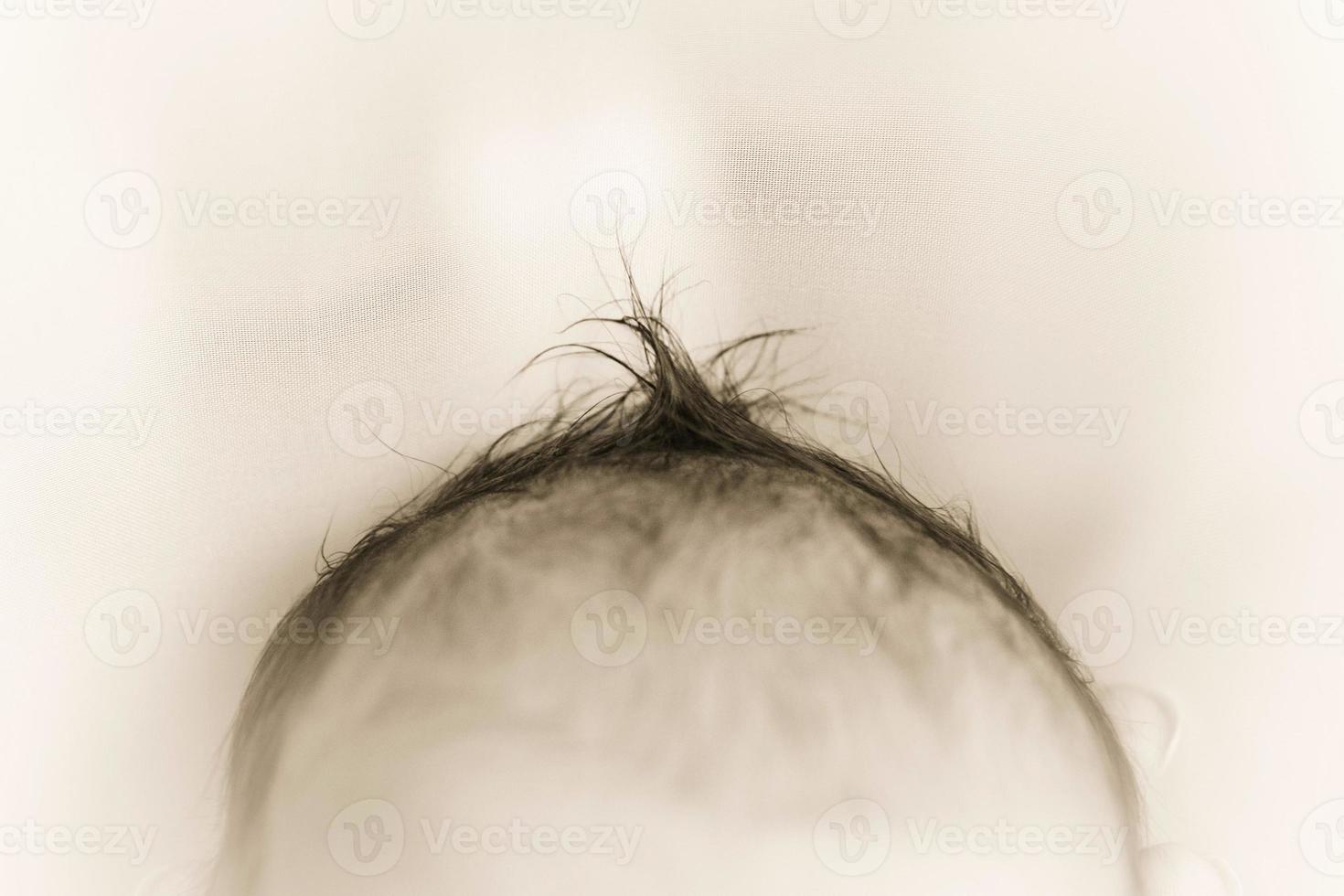 newborn baby hair close. black and white photo