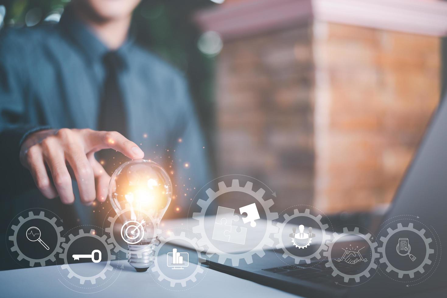 solution concept and demonstrating leadership strategies,Creativity that will lead business in the right direction,with innovation and brain power from brainstorming,Businessman pointing light bulb photo