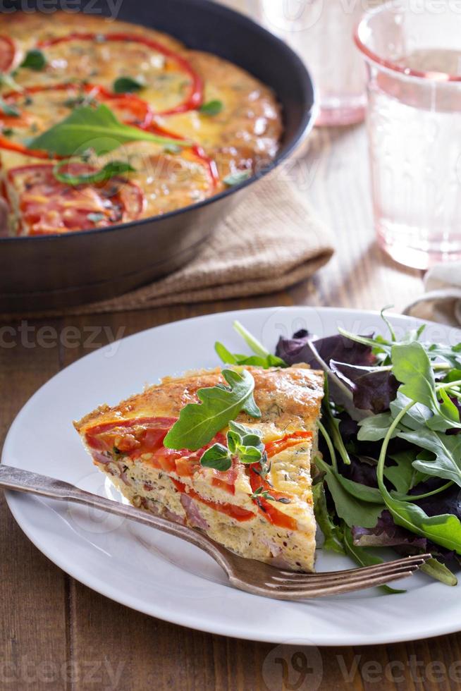 Frittata with vegetables and ham photo