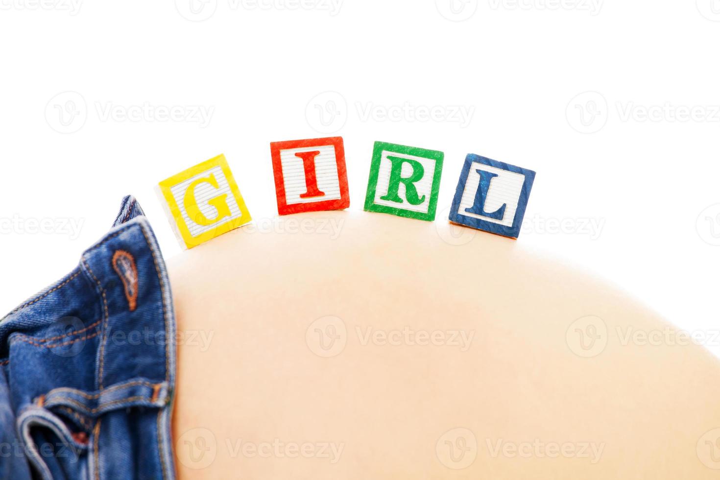 It's a girl concept with pregnant woman and block letters photo