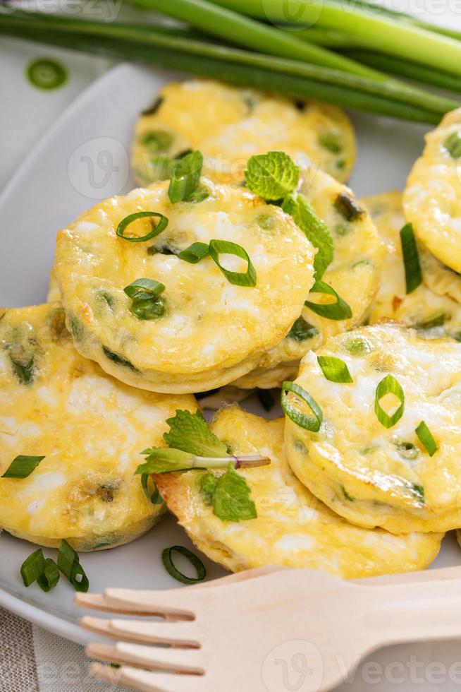 Mini frittatas with peas, green onion and feta photo