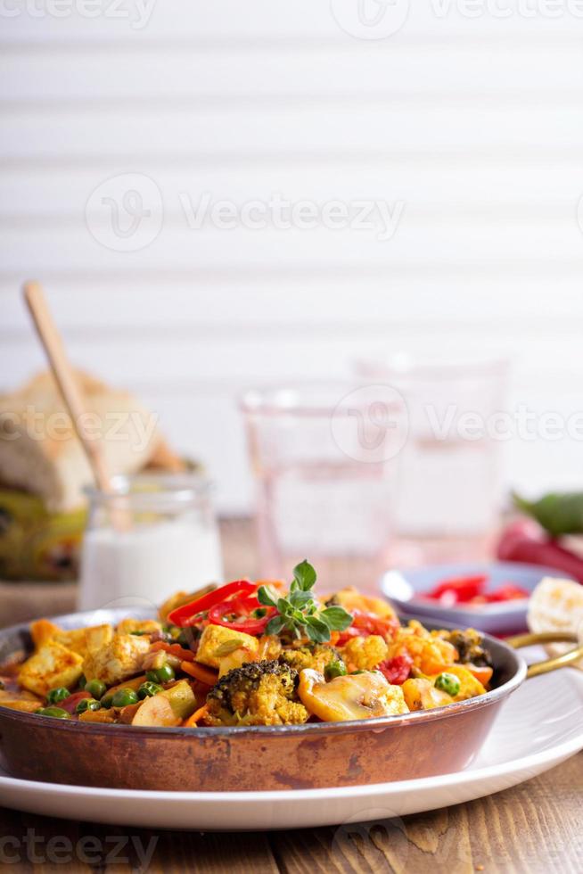 Vegan curry with tofu and vegetables photo
