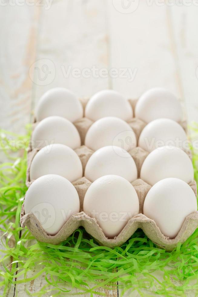White eggs ready to be decorated for Easter photo