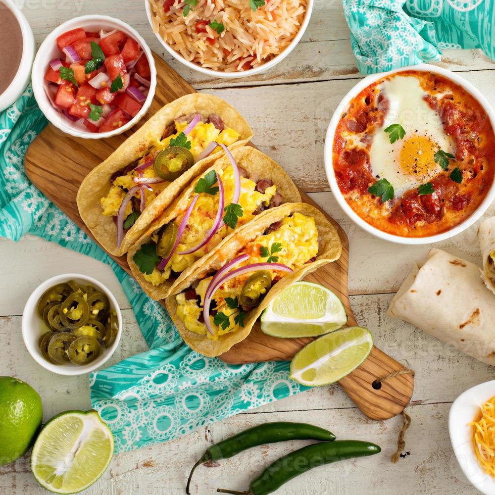 Variety of mexican cuisine dishes on a table photo