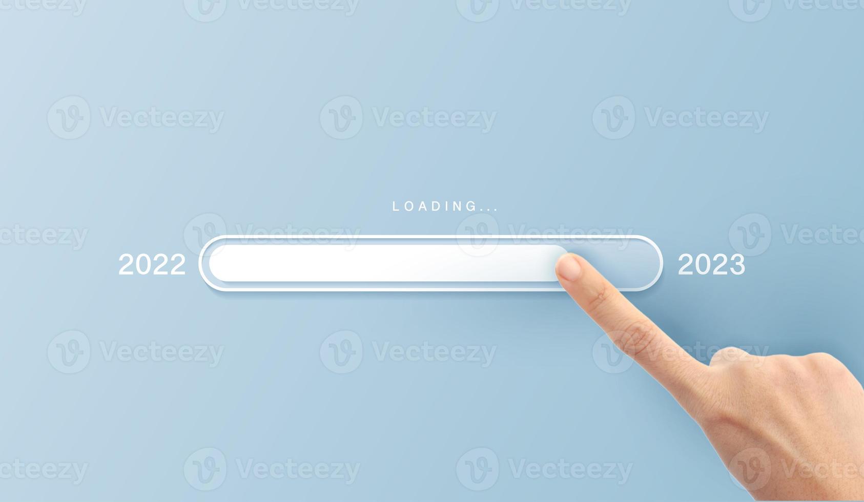 Loading new year 2022 to 2023 with hand point in progress bar. blue background for the holiday. photo