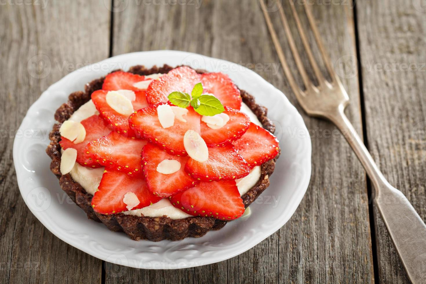Vegan tartelette with fresh strawberries photo