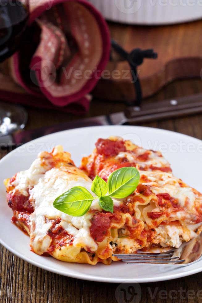 Lasagna rolls with tomato sauce photo