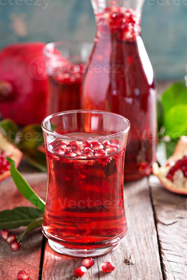 Pomegranate drink with sparkling water photo