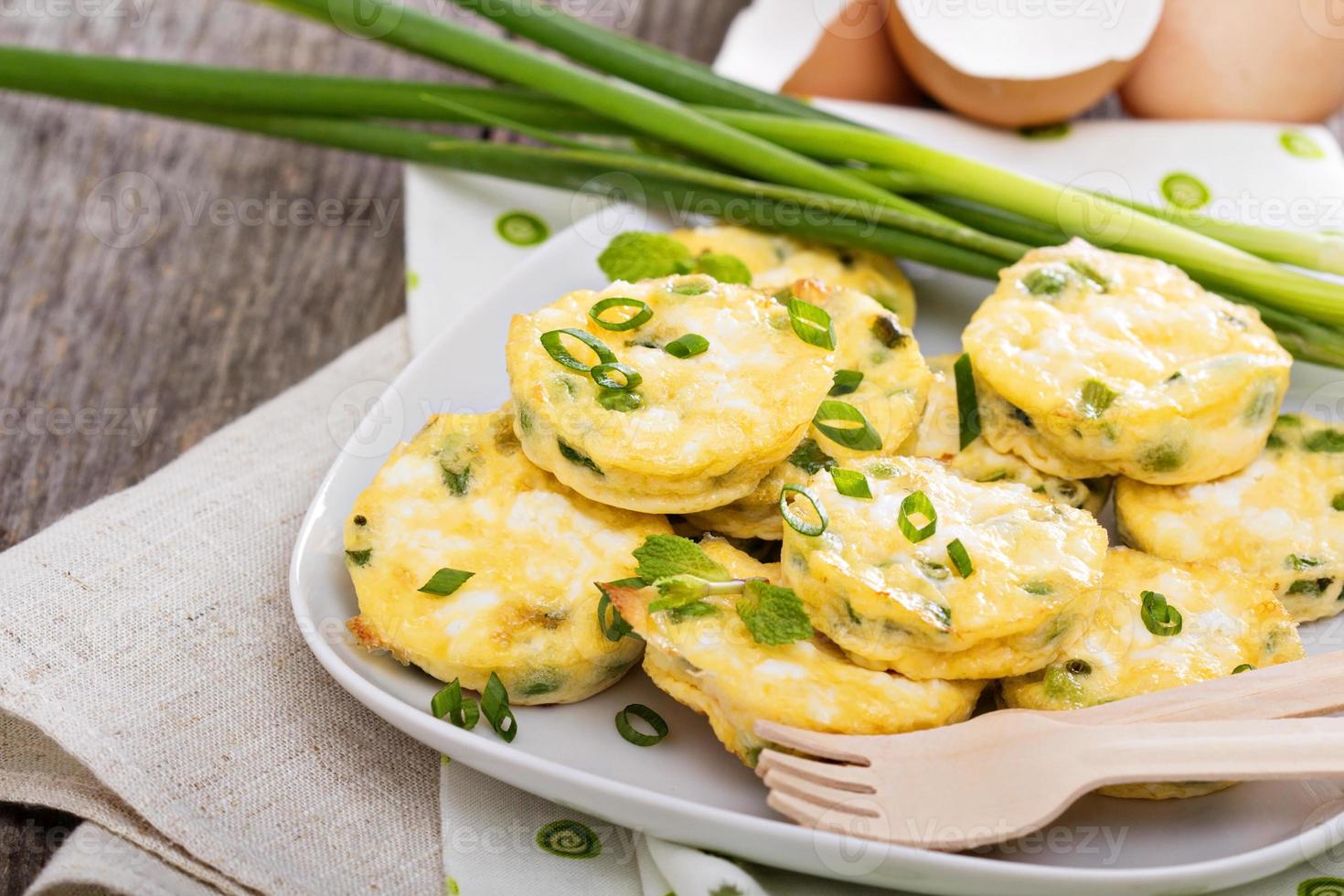 Mini frittatas with peas, green onion and feta photo