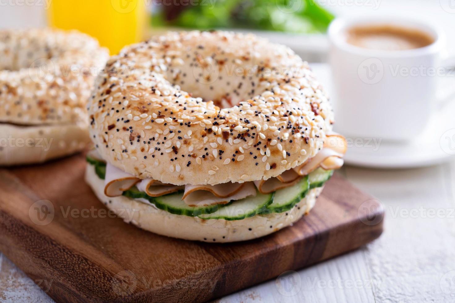 Everything bagels with cream cheese and cucumber photo
