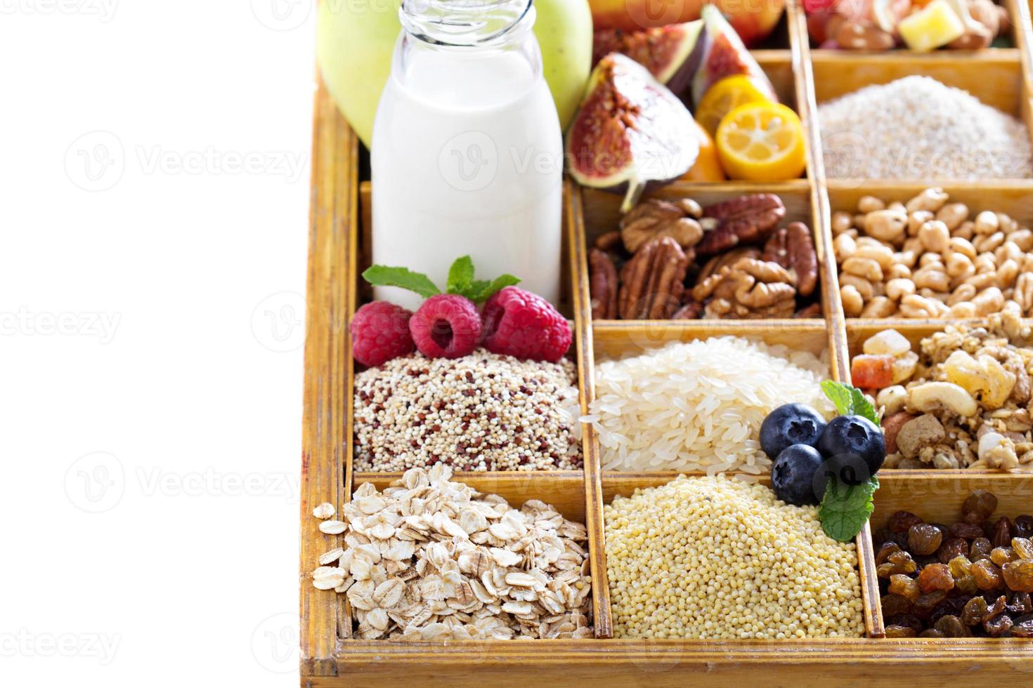 Breakfast items in wooden box isolated photo