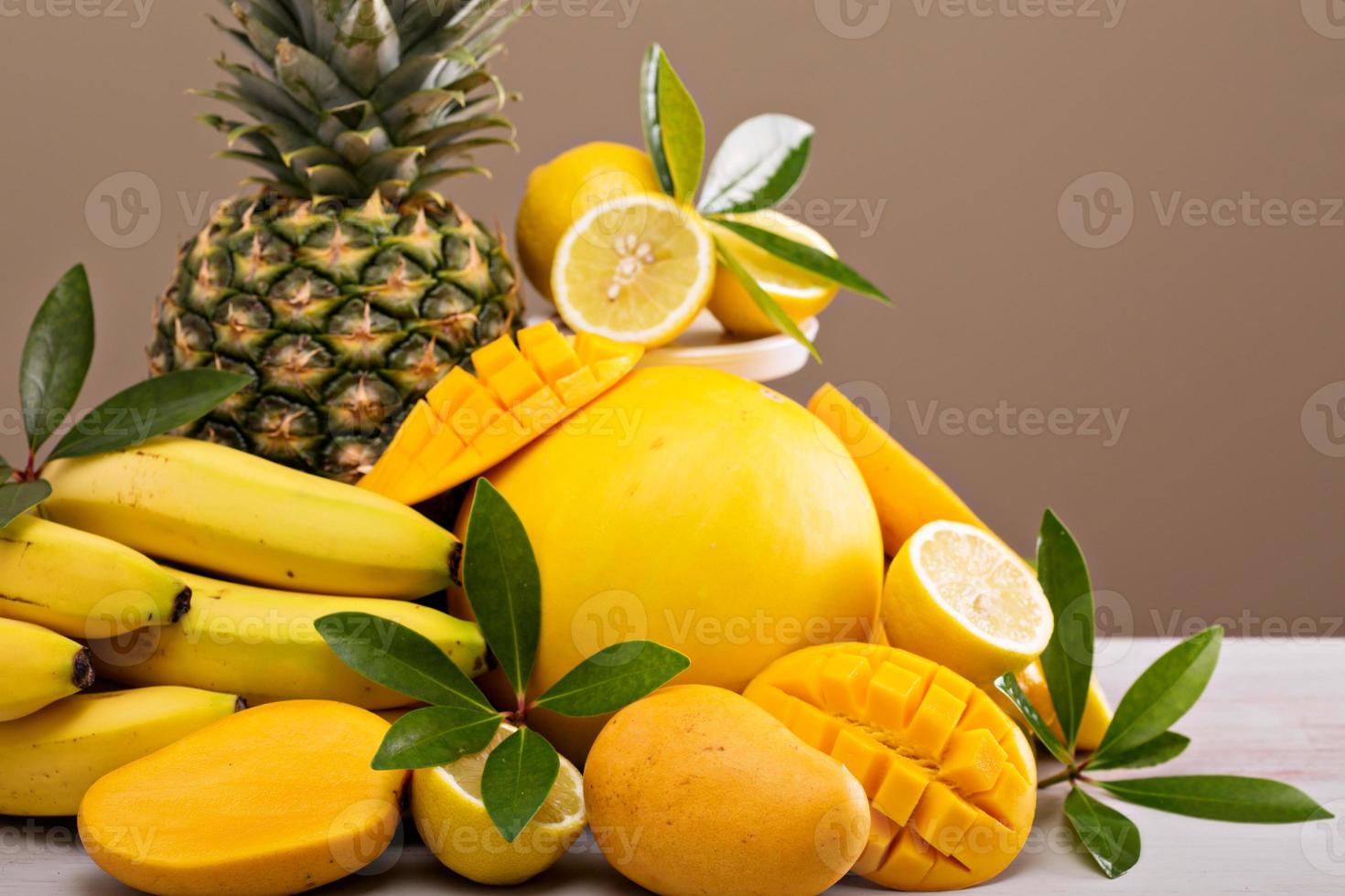 Tropical fruits on the table photo
