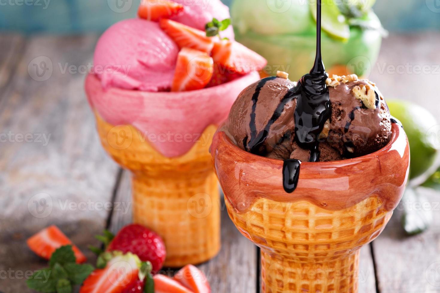 Variety of ice cream in bowls photo