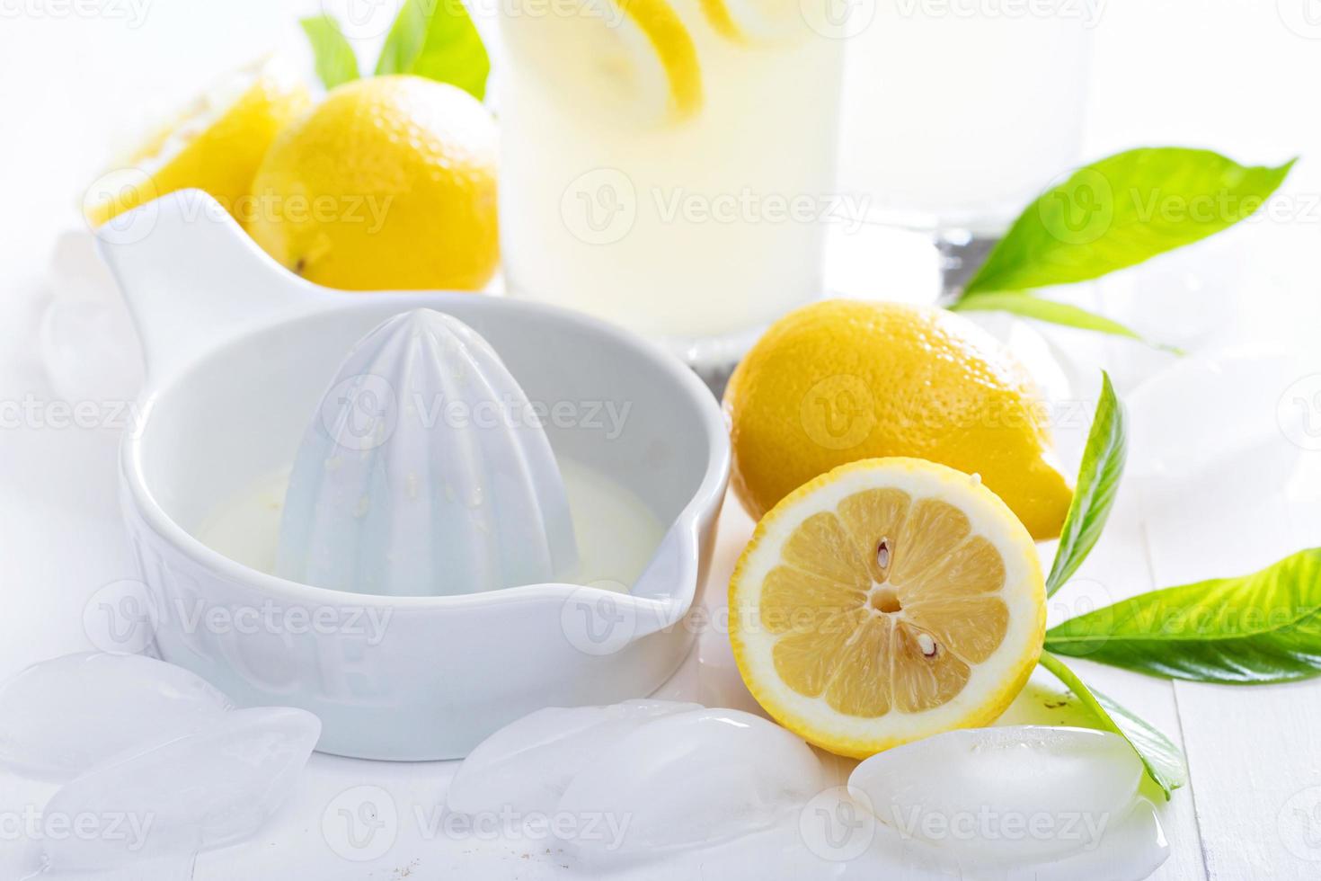 Making homemade lemonade with ceramic juicer photo