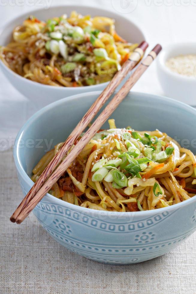 Stir fry with noodles, cabbage and carrot photo