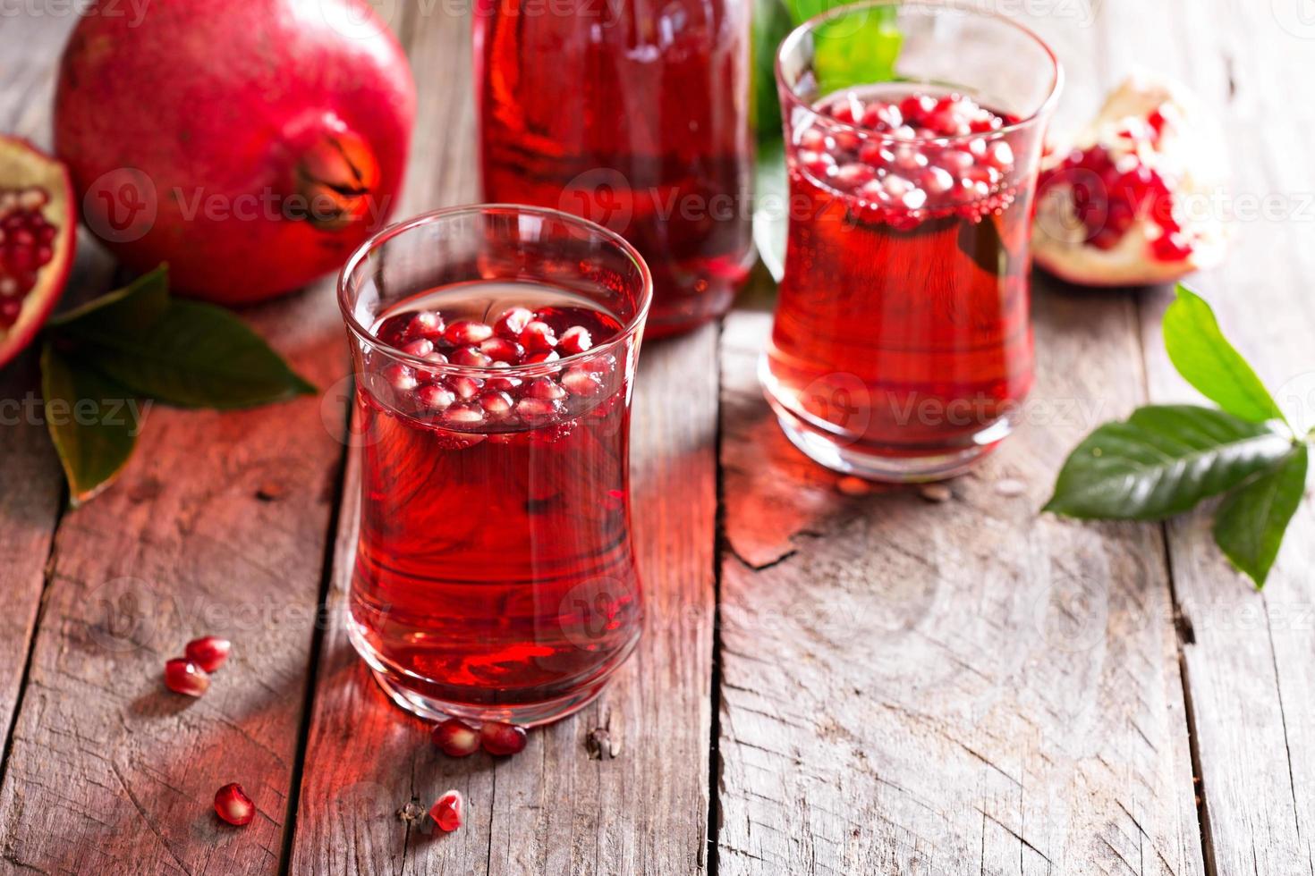 Pomegranate drink with sparkling water photo