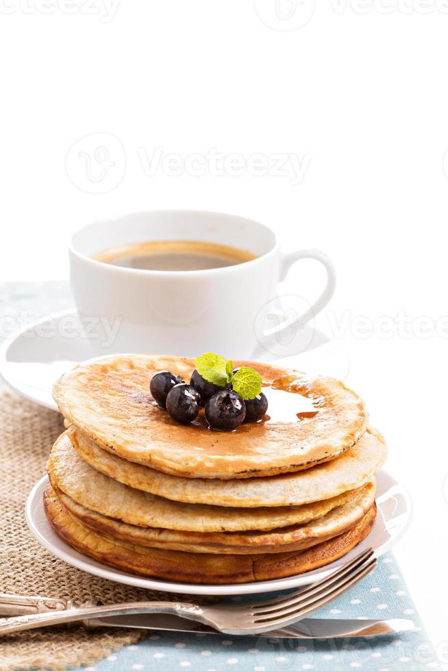 Stacked pancakes with berries photo