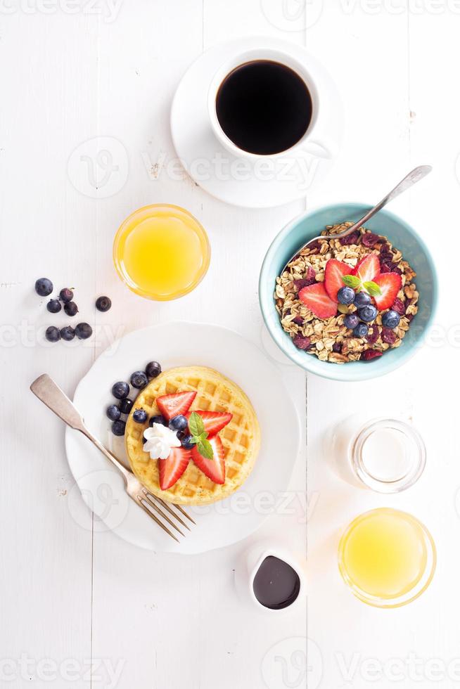 Breakfast waffles with fresh berries photo