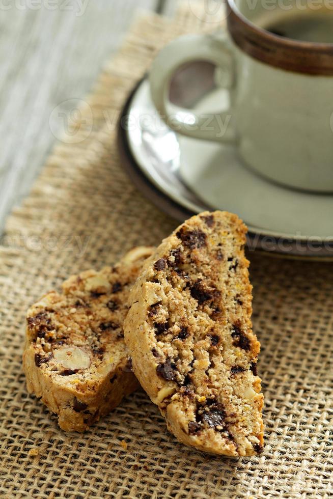 Pumpkin, nuts and chocolate biscotti with coffee photo