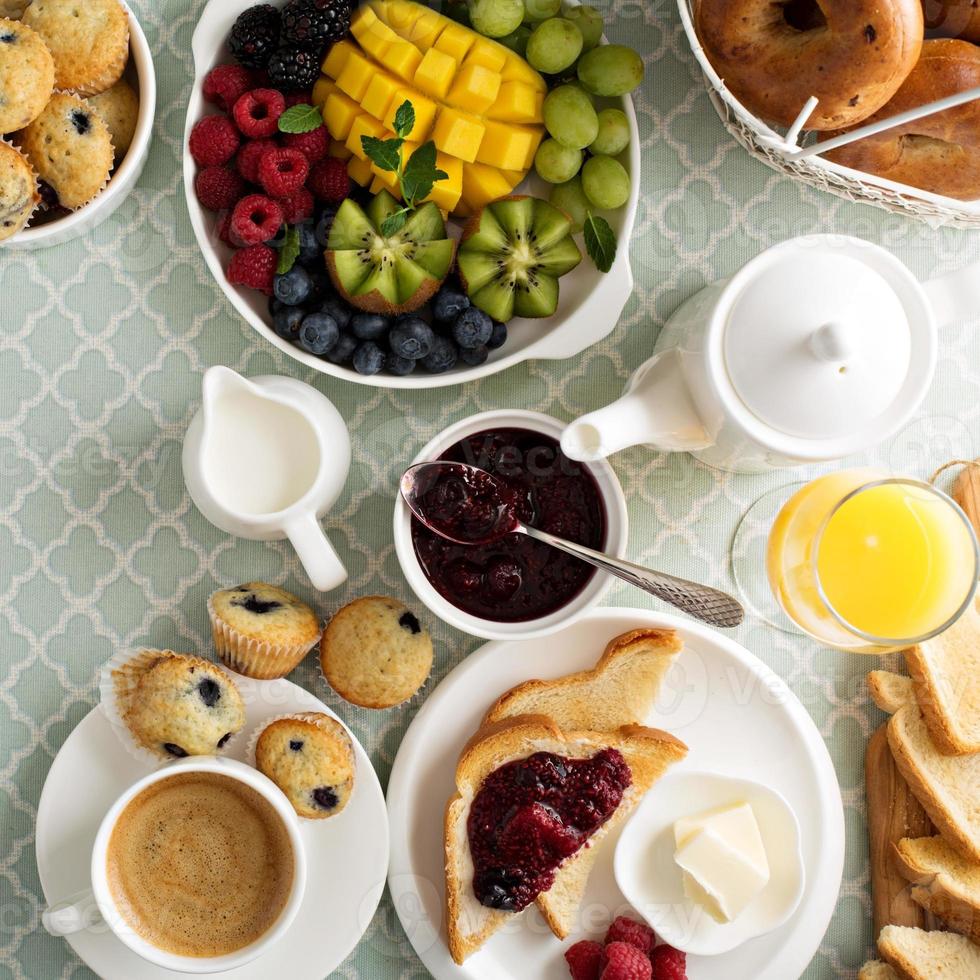 Fresh and bright continental breakfast table photo