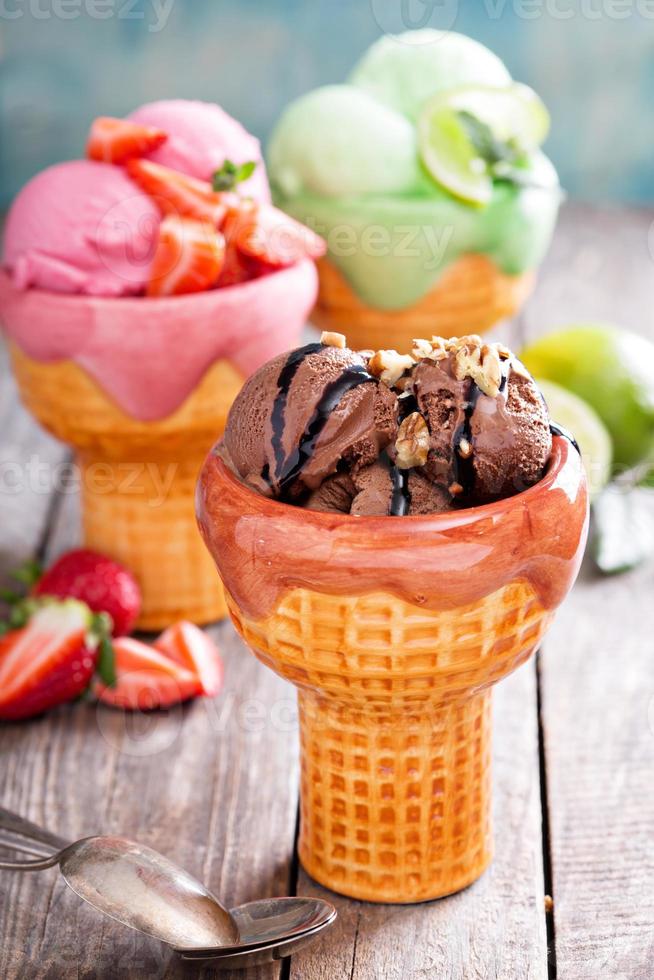 Variety of ice cream in bowls photo