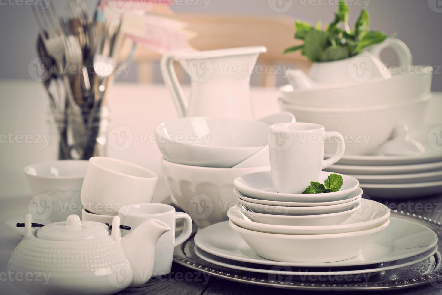 Variety of white dinnerware photo